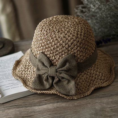 Straw Hat with Retro Bow – Foldable & Breathable for Summer!