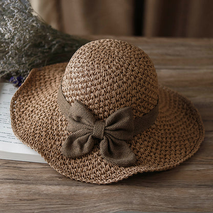Straw Hat with Retro Bow – Foldable & Breathable for Summer!