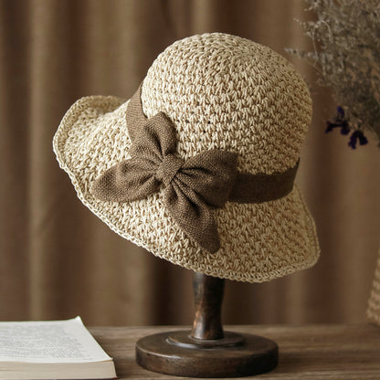 Straw Hat with Retro Bow – Foldable & Breathable for Summer!