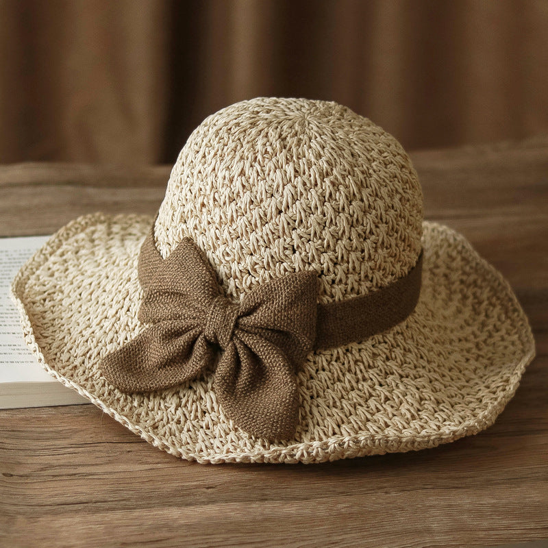 Straw Hat with Retro Bow – Foldable & Breathable for Summer!
